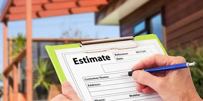 Roofer reviewing a commercial roof for an estimate in Collingwood, Ontario