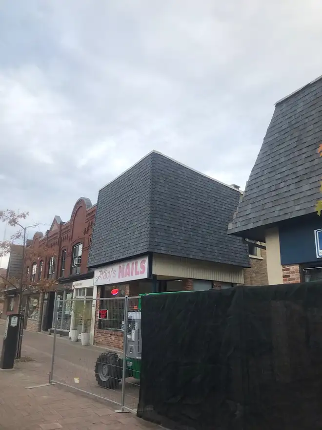 Weldon Roofing crew replacing a commercial roof